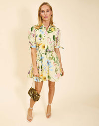 Verdant Blooms cotton poplin mini dress with mandarin collar, fitted waist, A-line skirt, and elbow-length tie sleeves.