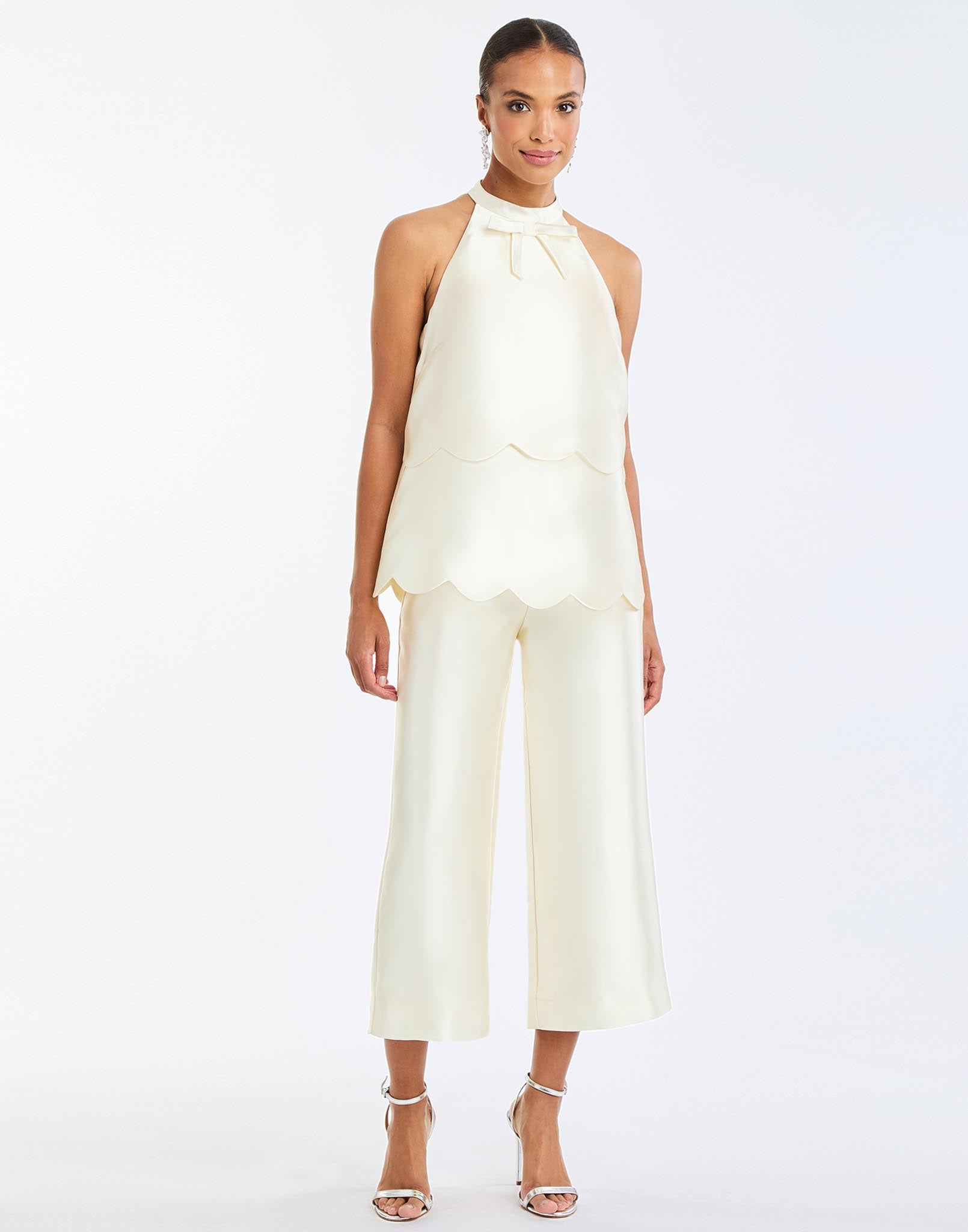 Cannes Convertible™ Mini Dress in Ivory full body – cocktail mini dress with scalloped tiers, halter bow neckline, and convertible cropped top styling by Mestiza New York.