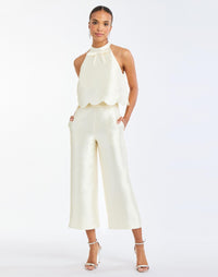 Cannes Convertible™ Mini Dress in Ivory full body – cocktail mini dress with scalloped tiers, halter bow neckline, and convertible cropped top styling by Mestiza New York.