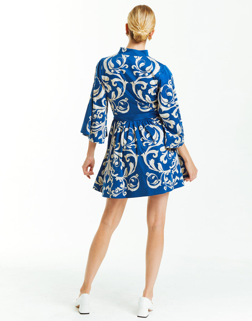 Printed blue and white cotton sateen mini dress with mandarin collar and bow belt detail