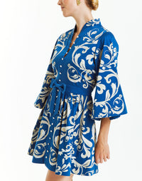 Printed blue and white cotton sateen mini dress with mandarin collar and bow belt detail