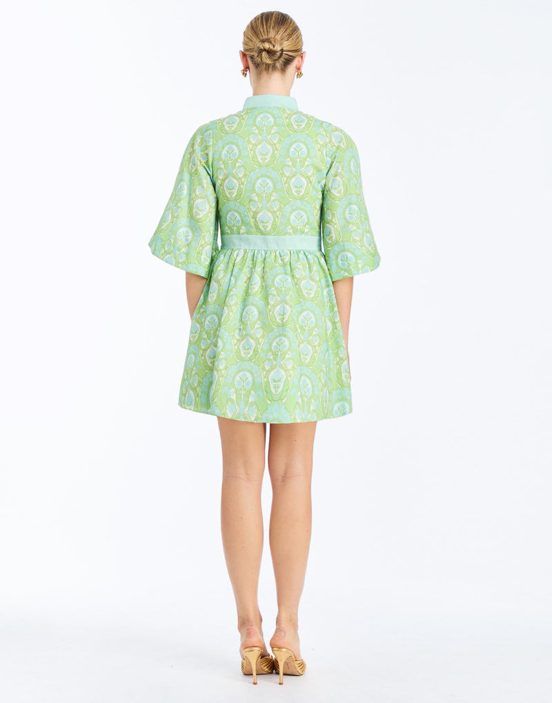 Back - Carmen Mini Dress in Trellis Verte is a printed linen mini with mandarin collar, butterfly sleeves, and waist bow.