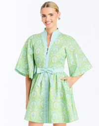 Front - Carmen Mini Dress in Trellis Verte is a printed linen mini with mandarin collar, butterfly sleeves, and waist bow.
