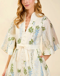 Carmen Mini Dress in Wisteria Toile featuring mandarin collar, butterfly sleeves, bow waist detail, and fit-and-flare mini silhouette.