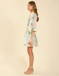Carmen Mini Dress in Wisteria Toile featuring mandarin collar, butterfly sleeves, bow waist detail, and fit-and-flare mini silhouette.