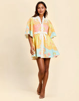 Carmen Mini Dress in Venetian Paisley linen with butterfly sleeves, mandarin collar, and bow waist detail.