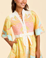 Carmen Mini Dress in Venetian Paisley linen with butterfly sleeves, mandarin collar, and bow waist detail.