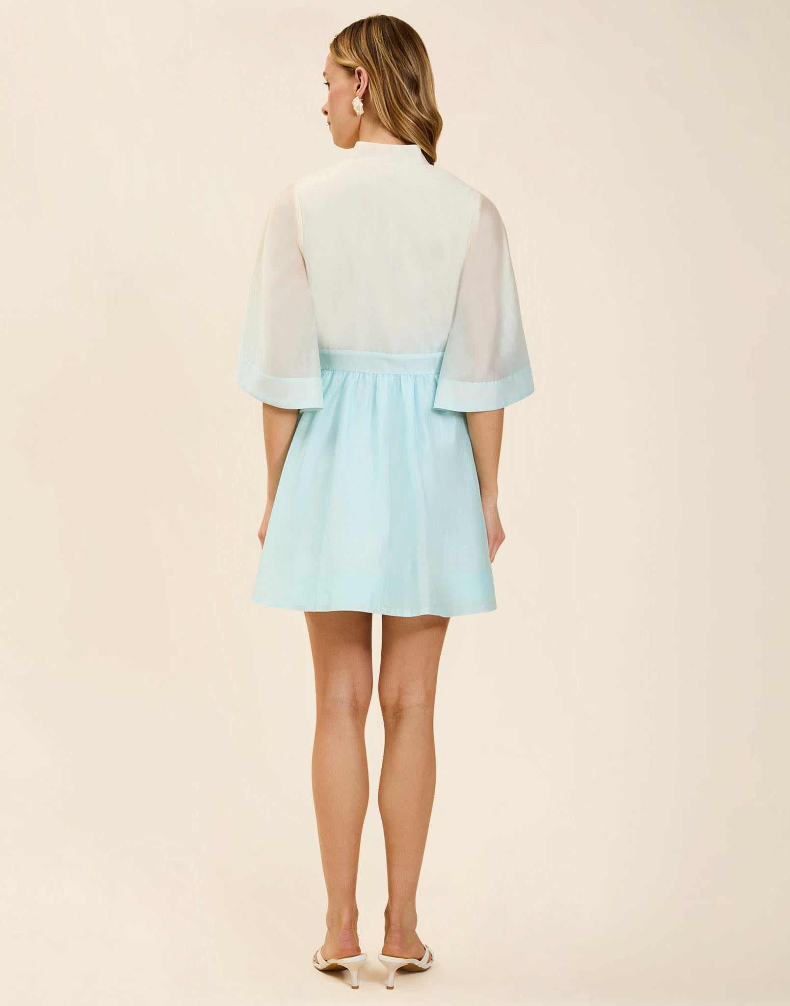 Carmen Mini Dress in Powder Ombré linen organza with mandarin collar, butterfly sleeves, bow waist detail, and fit-and-flare mini silhouette.