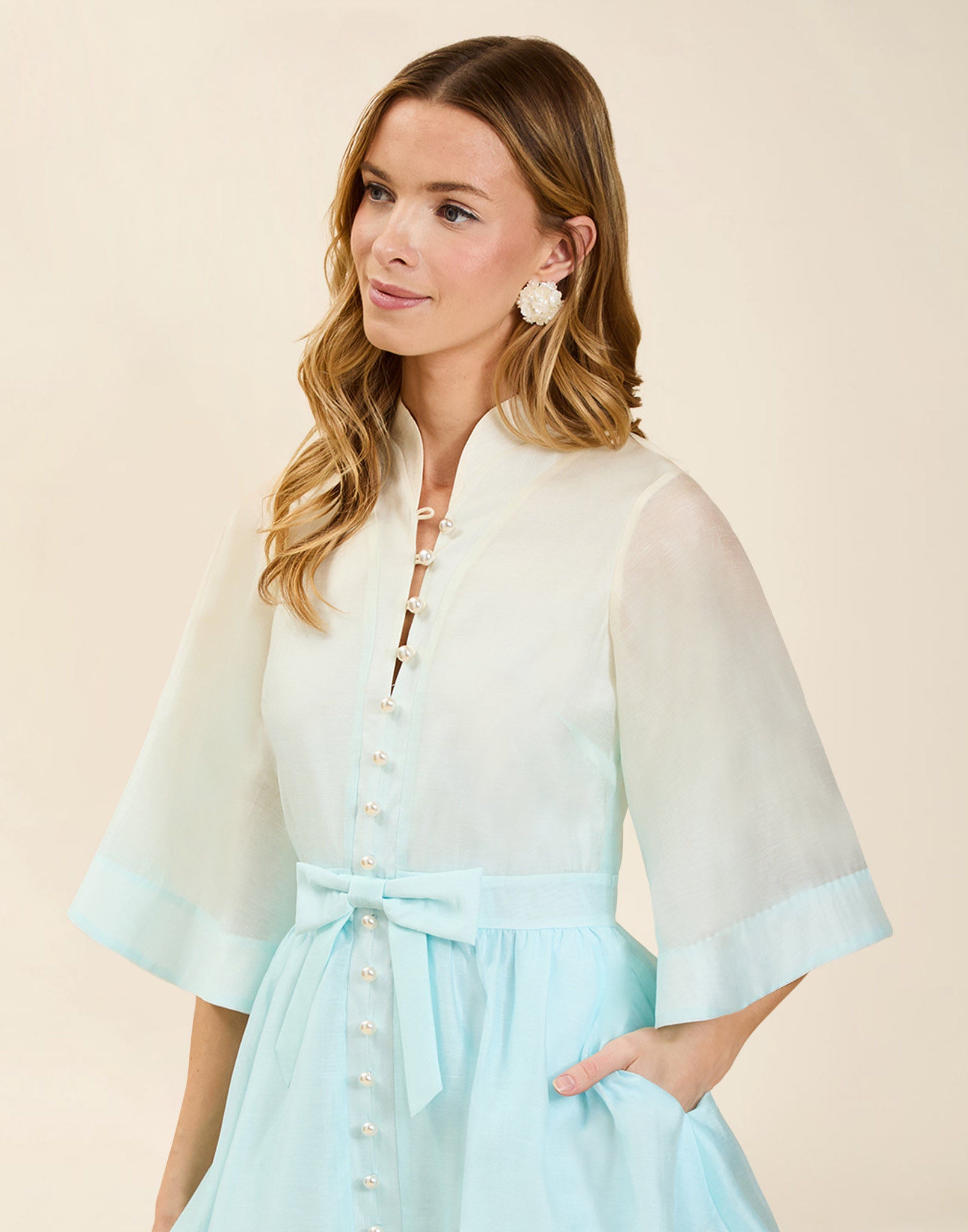 Carmen Mini Dress in Powder Ombré linen organza with mandarin collar, butterfly sleeves, bow waist detail, and fit-and-flare mini silhouette.
