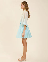 Carmen Mini Dress in Powder Ombré linen organza with mandarin collar, butterfly sleeves, bow waist detail, and fit-and-flare mini silhouette.