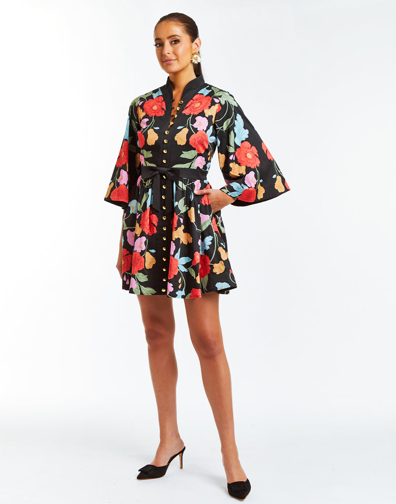 Fit and flare mini dress with bold floral print, Mandarin collar, and built-in bow belt.