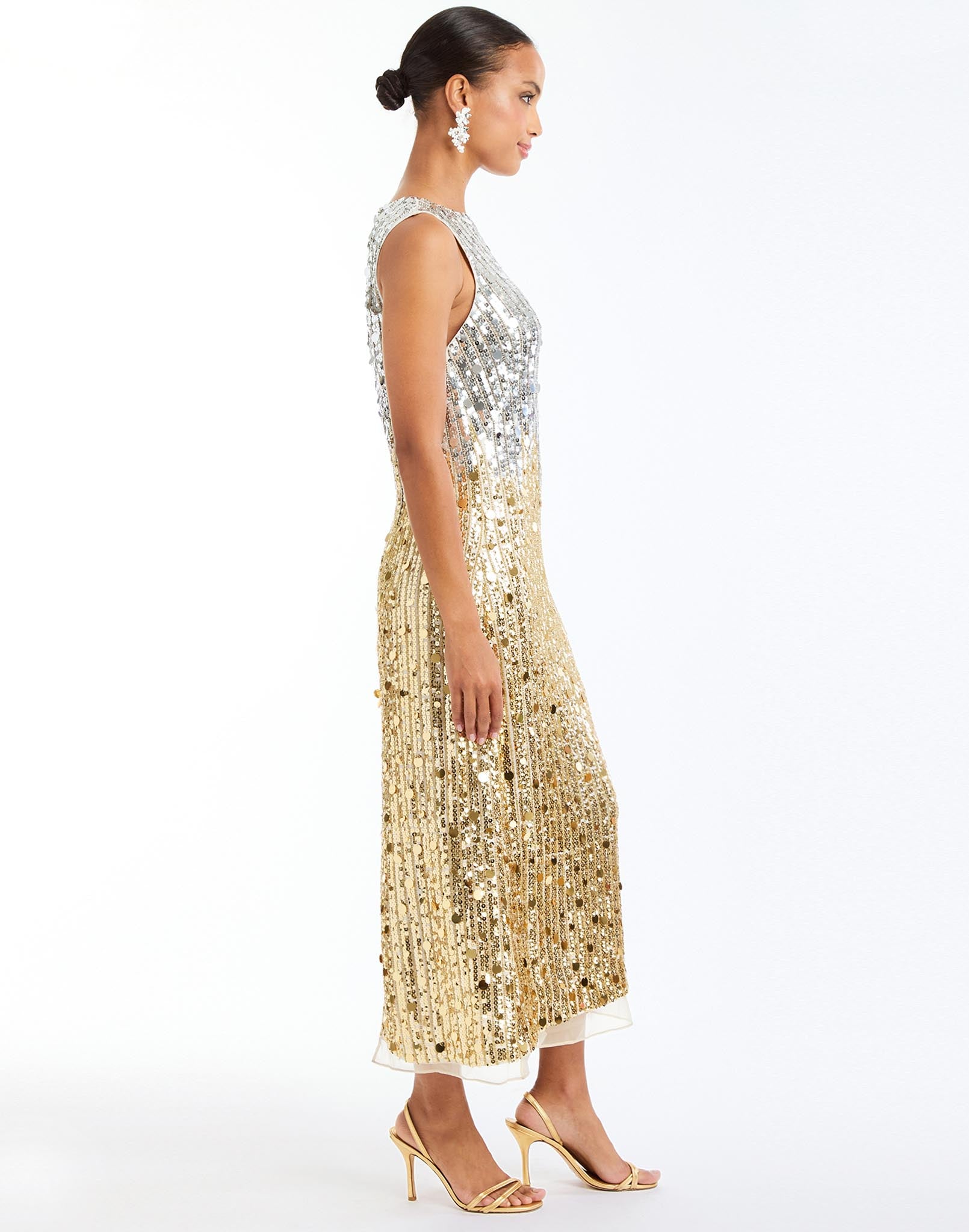 Celestina Sequin Tea Length Dress in Champagne Ombre side – sleeveless ombre sequin evening dress with crew neckline, organza hem, and column silhouette by Mestiza New York.