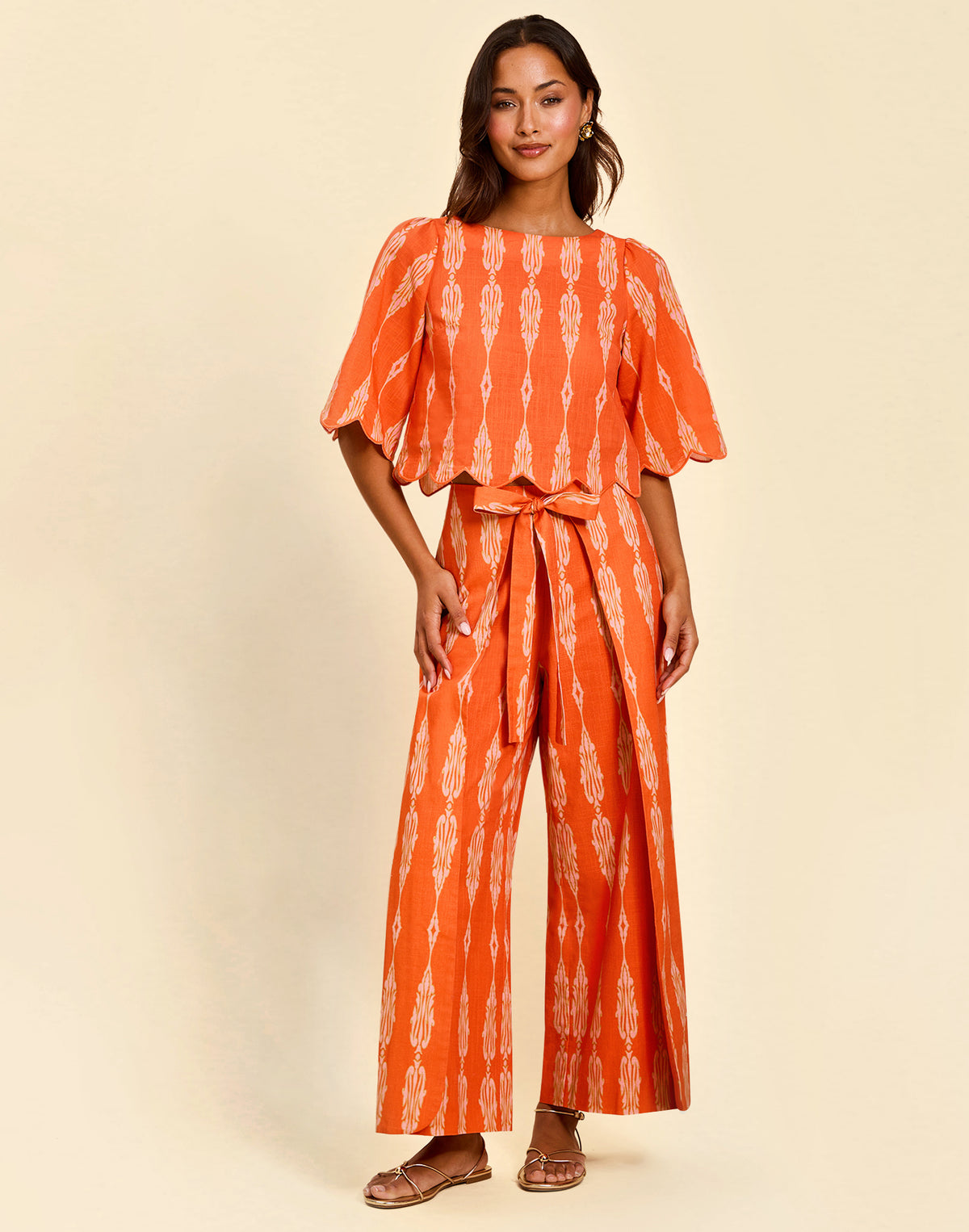 Women’s linen cropped top in Hibiscus Mosaic print with embroidered bell sleeves and scalloped detailing