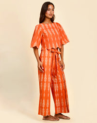 Women’s linen cropped top in Hibiscus Mosaic print with embroidered bell sleeves and scalloped detailing