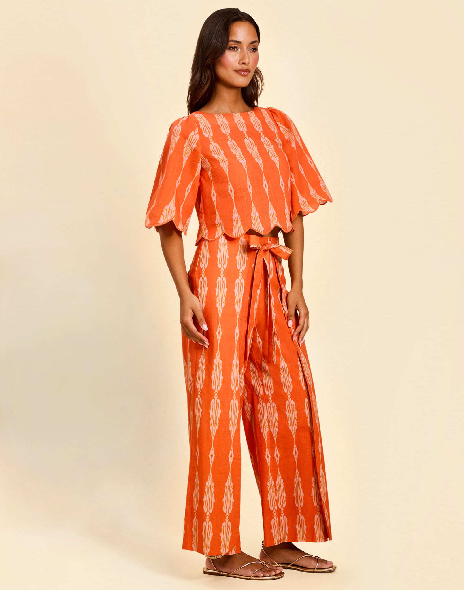 Women’s linen cropped top in Hibiscus Mosaic print with embroidered bell sleeves and scalloped detailing