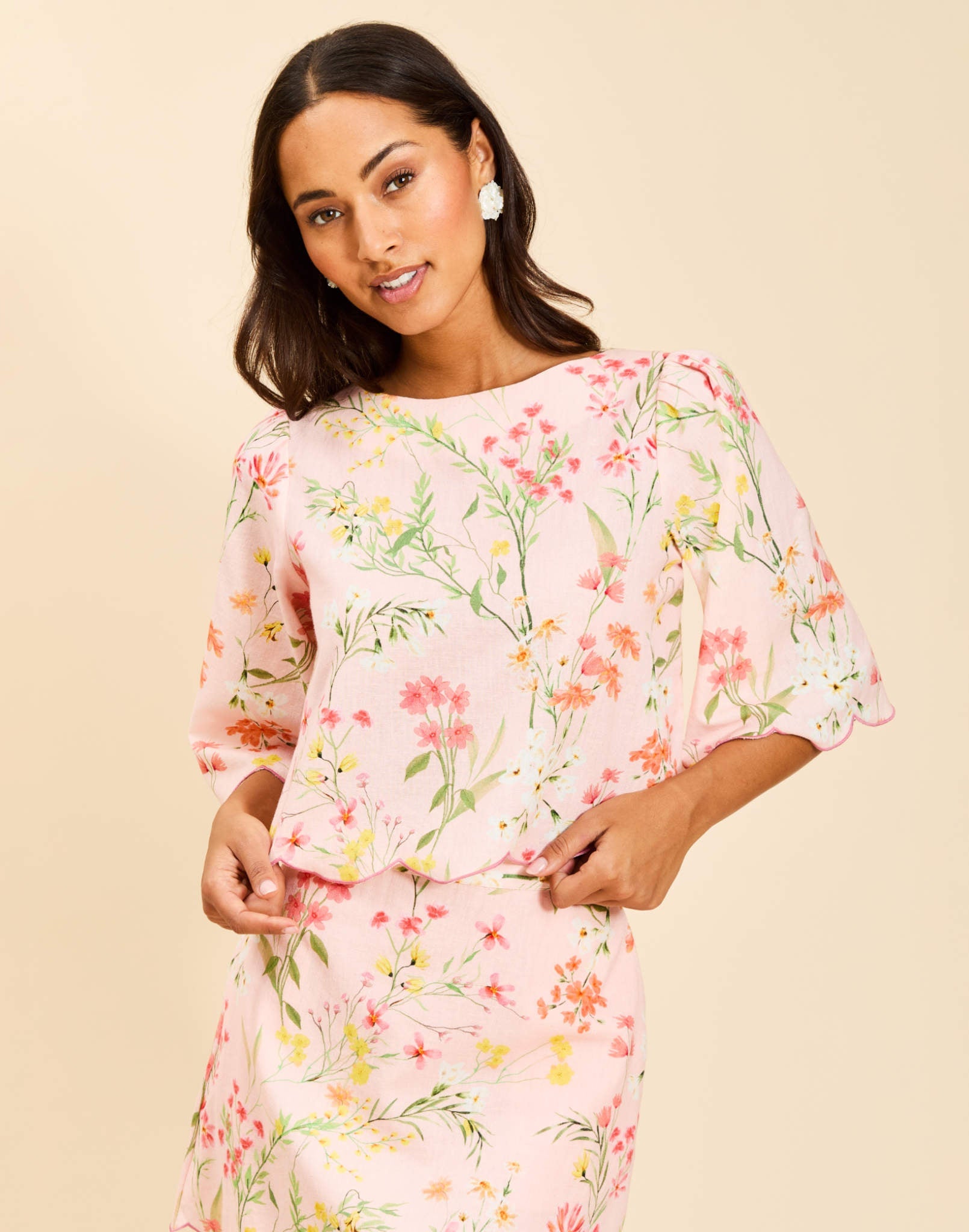 Charlize Top in Rose Vines linen with boat neckline, embroidered scalloped hem, wide bell sleeves, and relaxed silhouette.