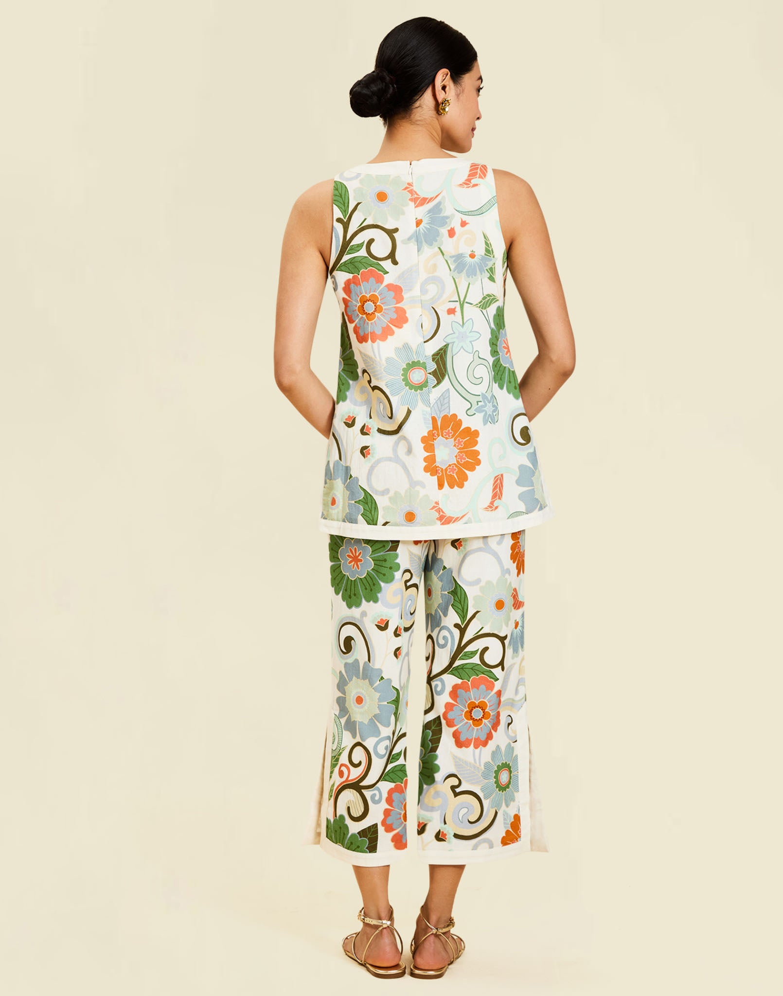 Corey Tunic Top in Groovy Florals linen with ivory banding, side slits, and a relaxed tunic silhouette.