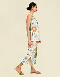 Corey Tunic Top in Groovy Florals linen with ivory banding, side slits, and a relaxed tunic silhouette.