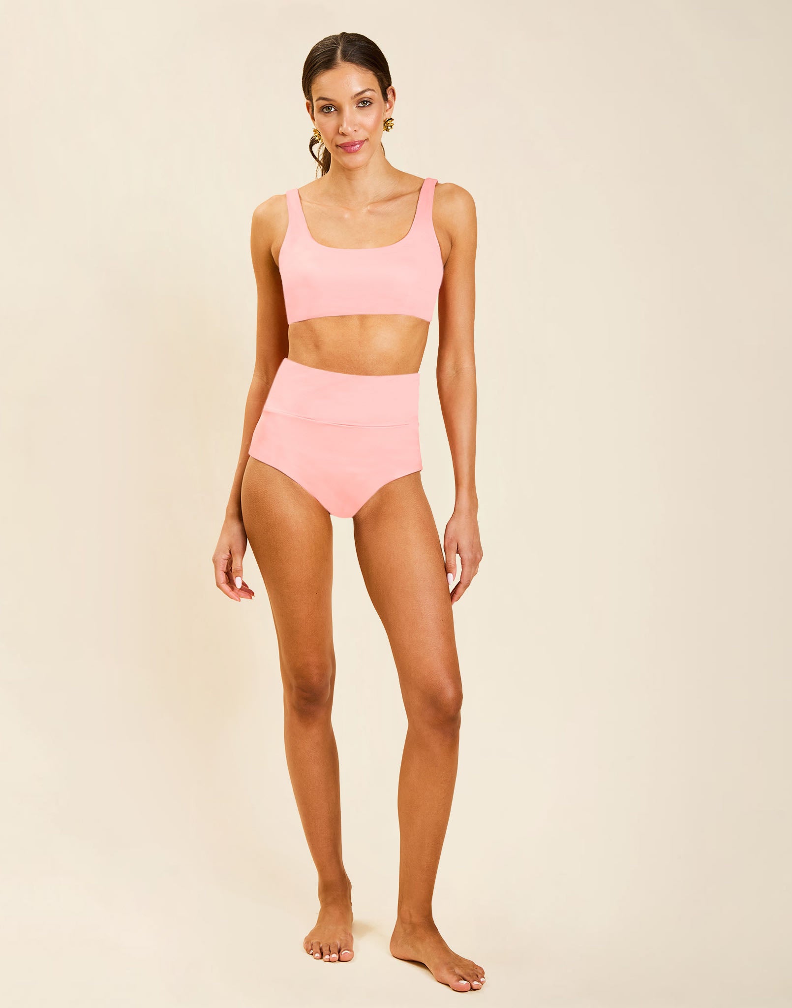 Model wearing Corinna Convertible Bikini Top in Florentine Blush, reversible solid to flourish print with straight neckline.