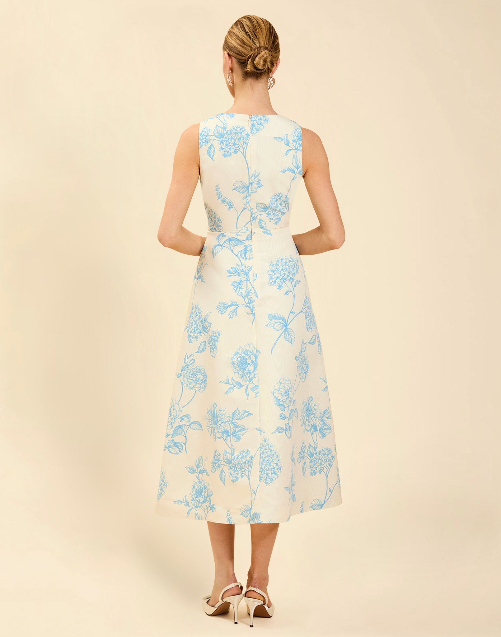 Cristobal Midi Dress in Powder Batiste moiré with crew neckline, sleeveless bodice, full A-line midi skirt, and hidden side pockets.