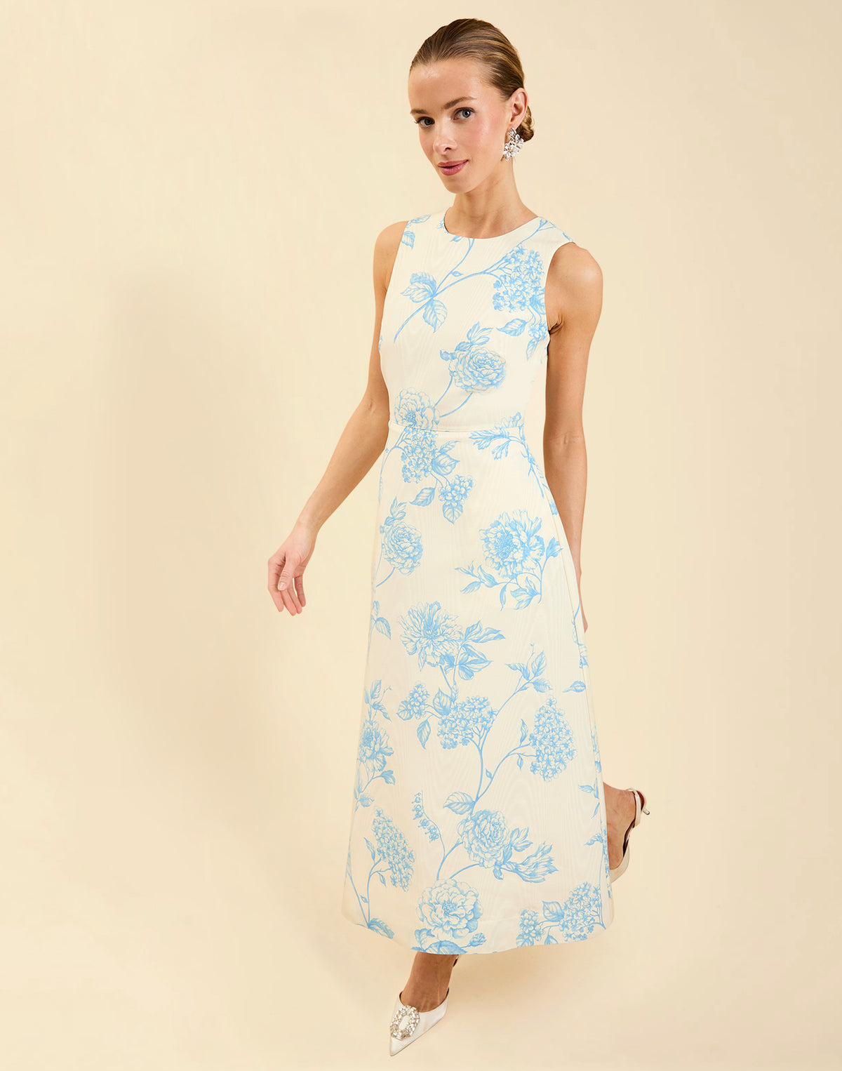 Cristobal Midi Dress in Powder Batiste moiré with crew neckline, sleeveless bodice, full A-line midi skirt, and hidden side pockets.