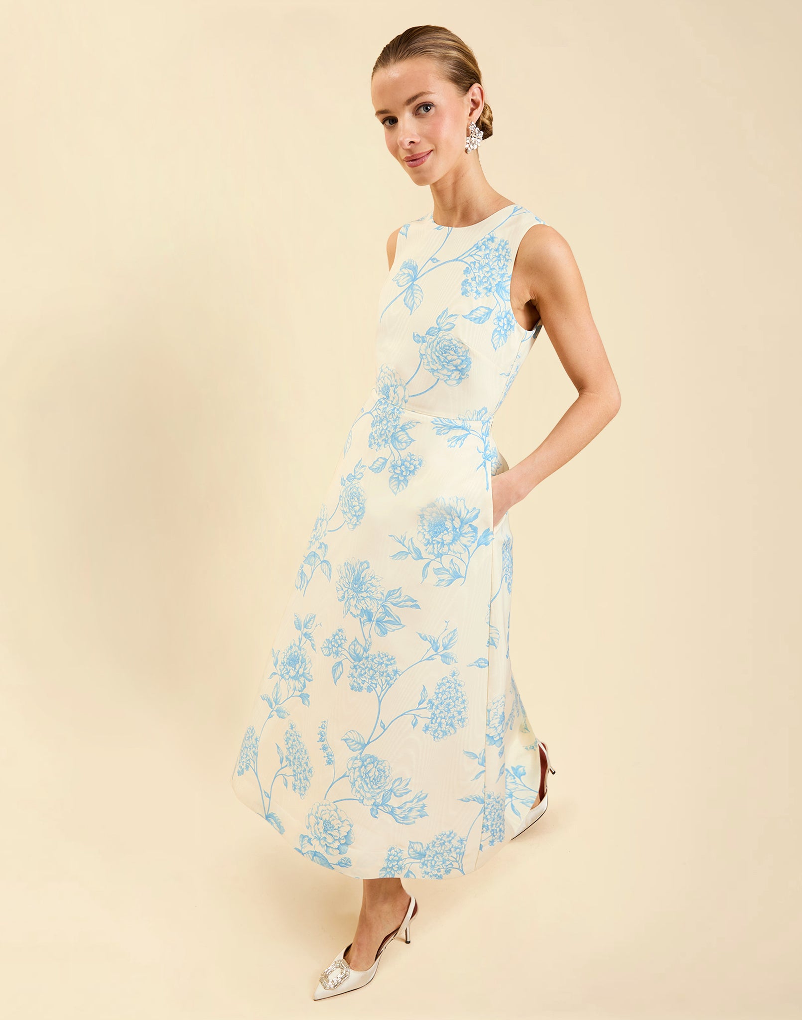 Cristobal Midi Dress in Powder Batiste moiré with crew neckline, sleeveless bodice, full A-line midi skirt, and hidden side pockets.