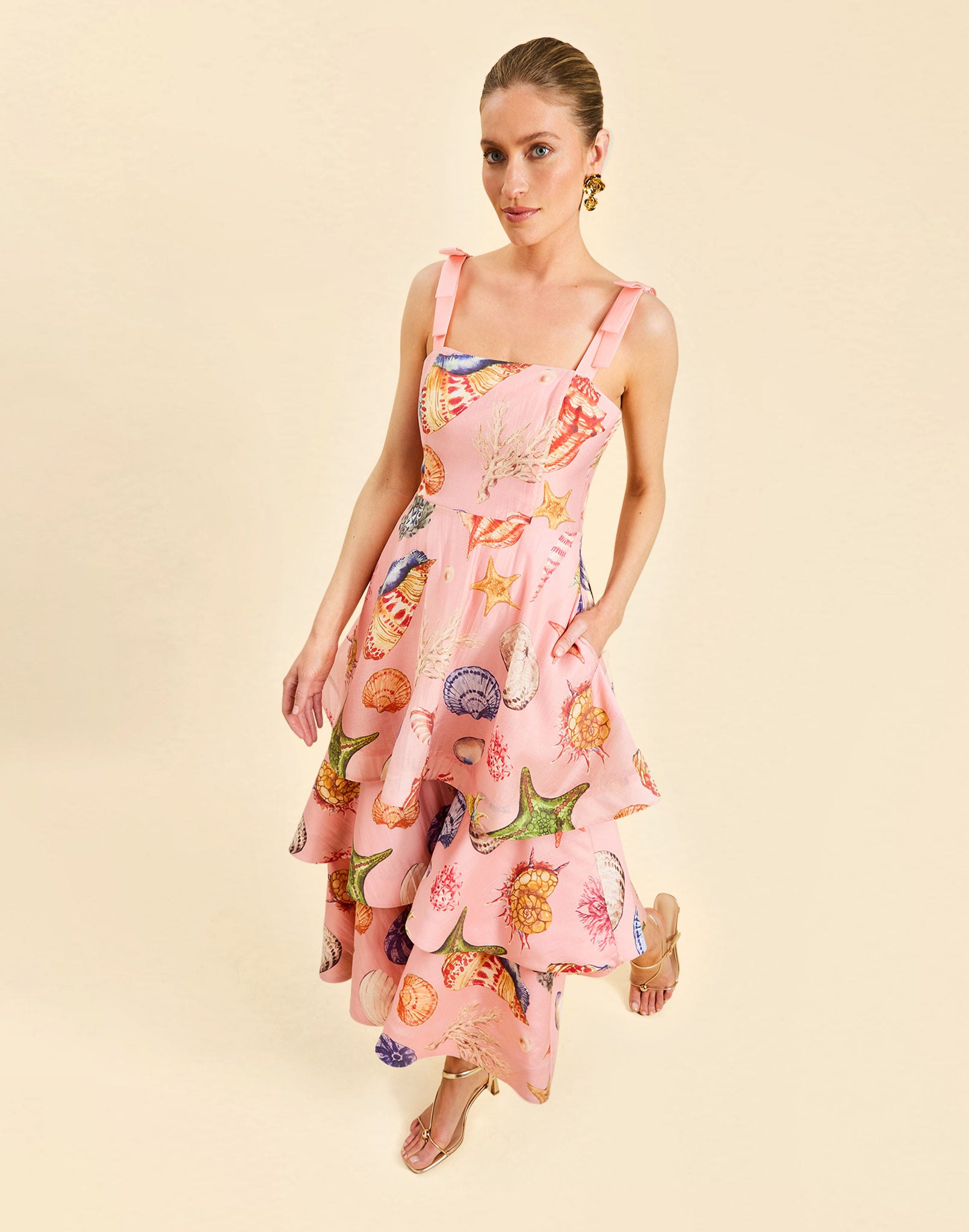 Darling Convertible Midi Dress in Seashell Symphony linen with strappy bodice, removable tiers, and convertible midi-to-mini silhouette.