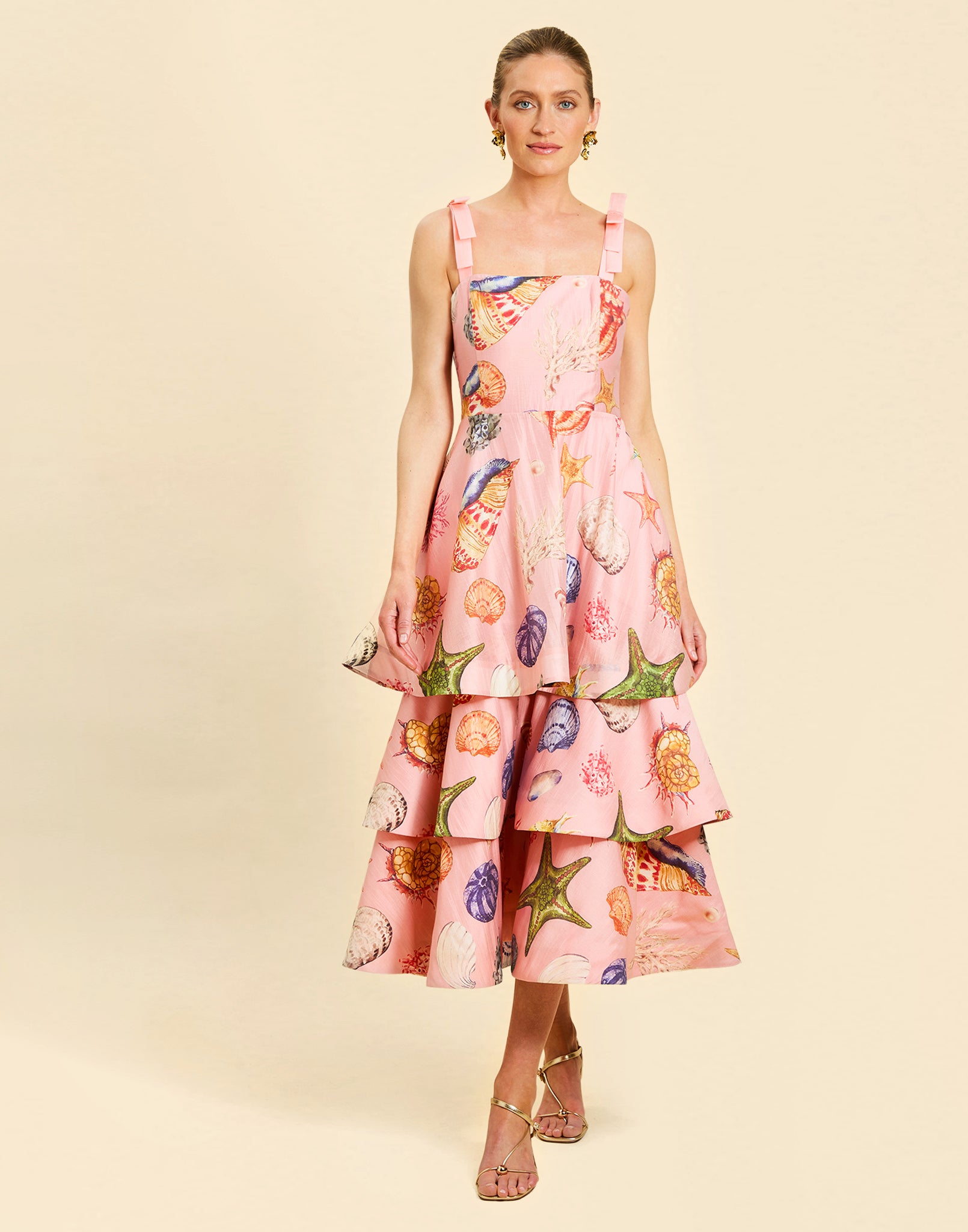 Darling Convertible Midi Dress in Seashell Symphony linen with strappy bodice, removable tiers, and convertible midi-to-mini silhouette.