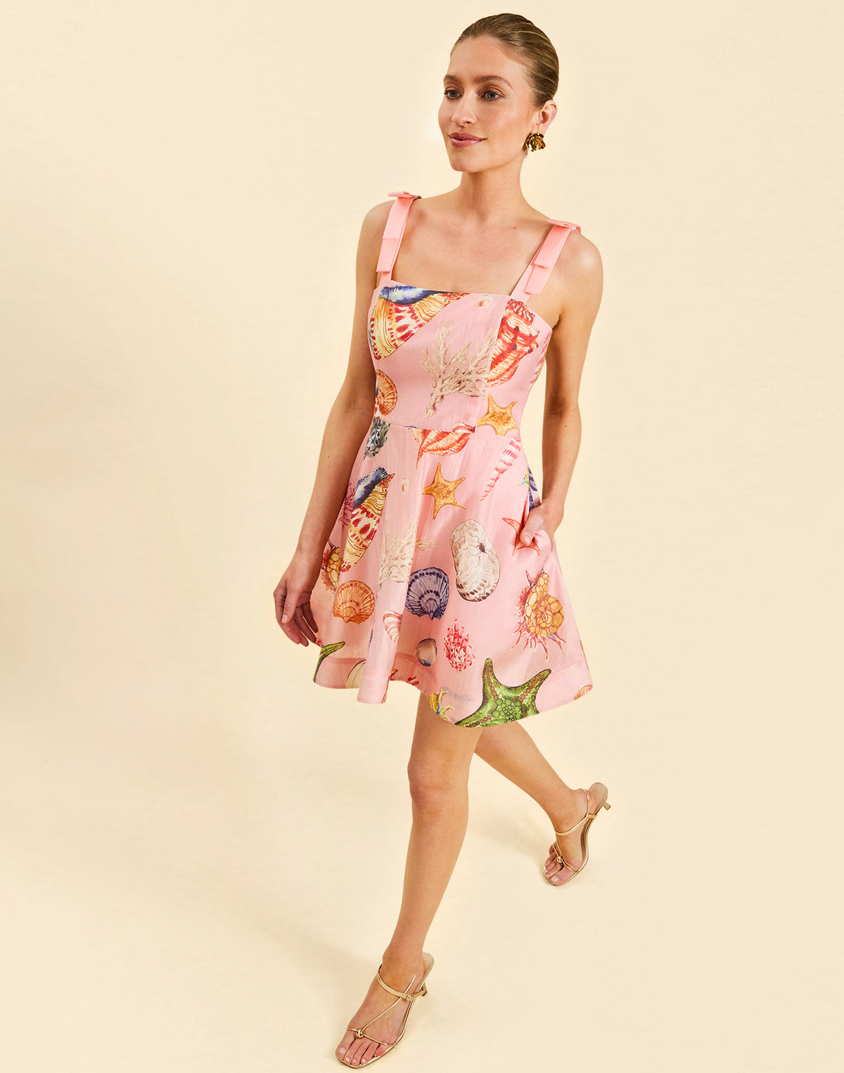 Darling Convertible Midi Dress in Seashell Symphony linen with strappy bodice, removable tiers, and convertible midi-to-mini silhouette.