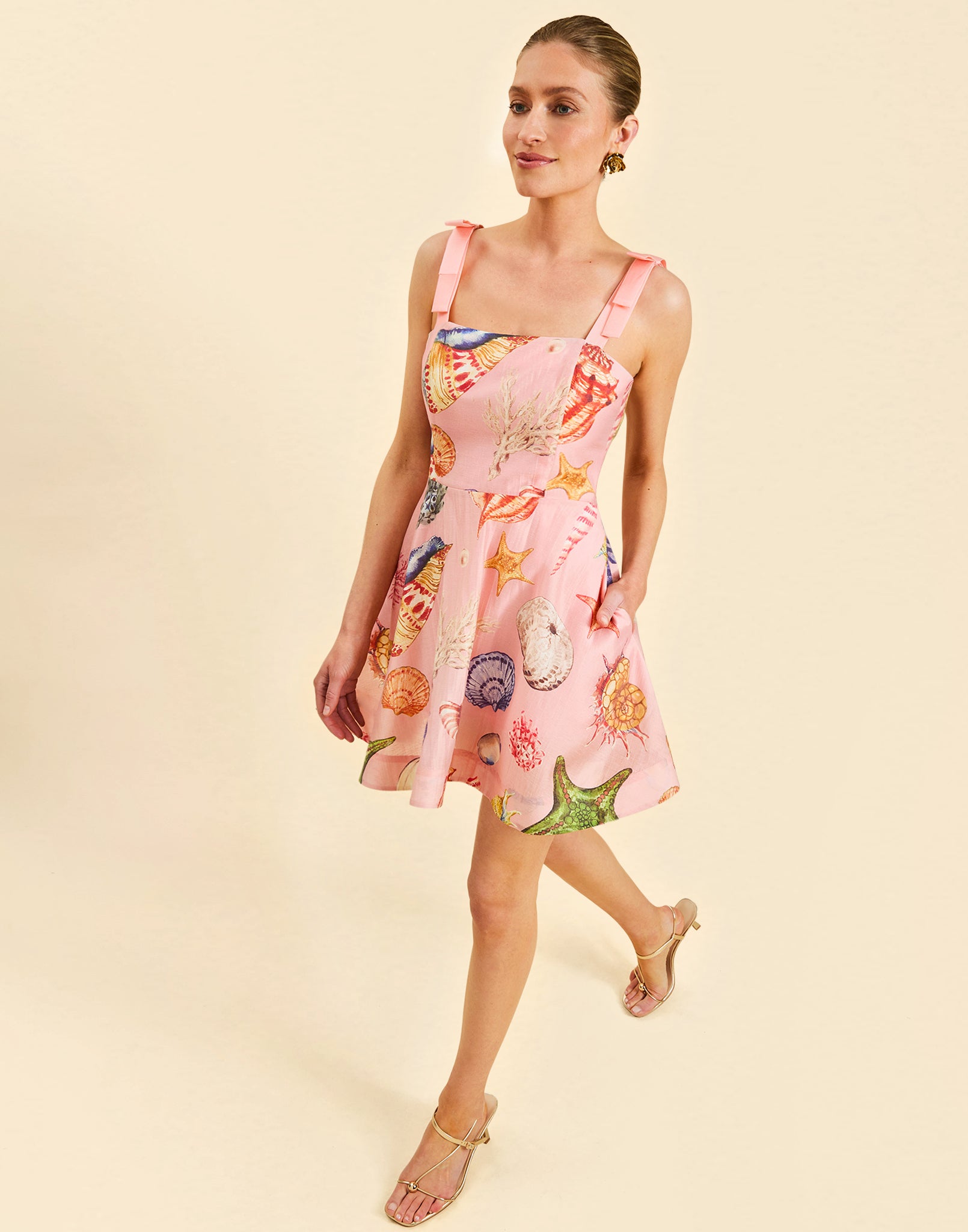 Darling Convertible Midi Dress in Seashell Symphony linen with strappy bodice, removable tiers, and convertible midi-to-mini silhouette.