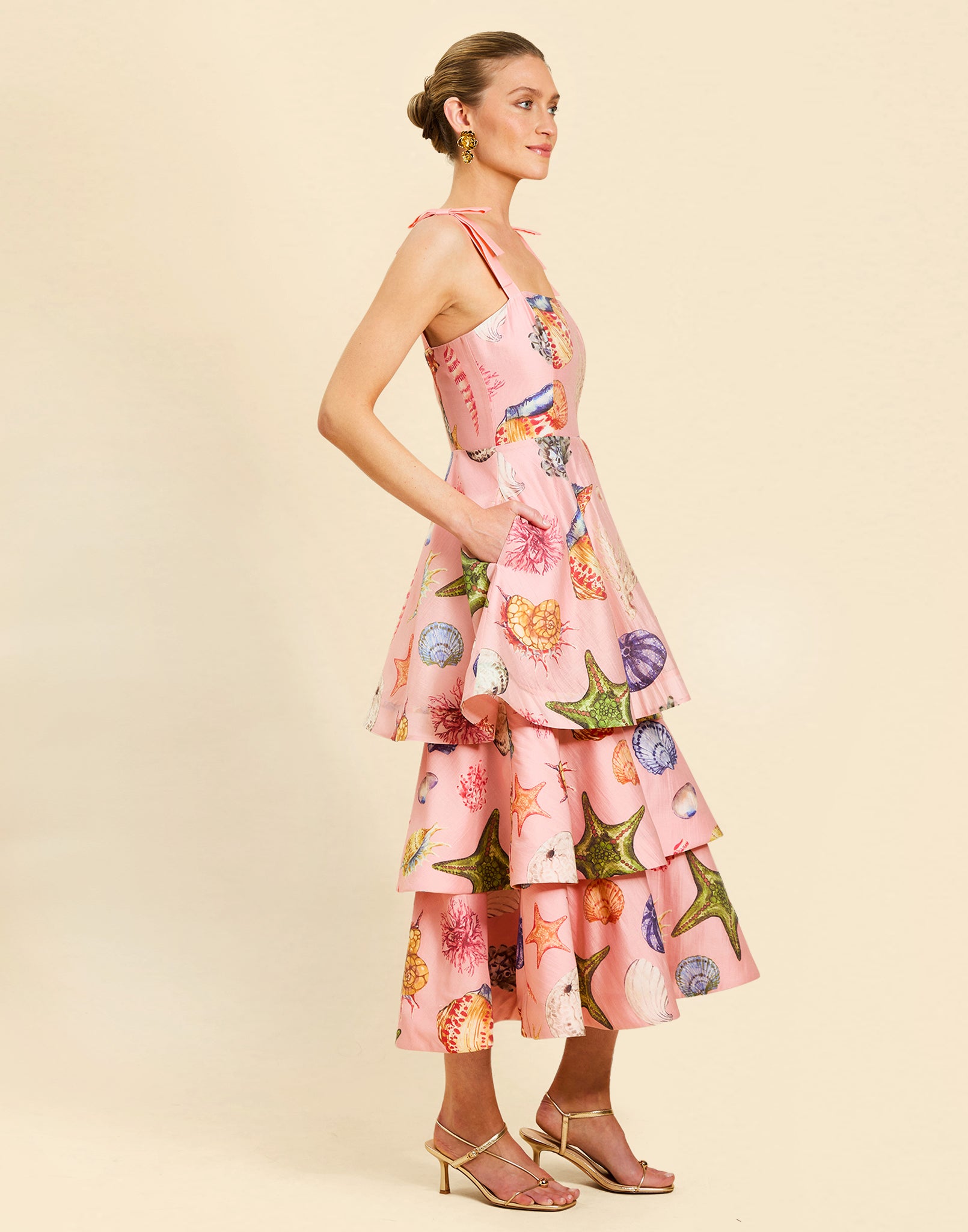Darling Convertible Midi Dress in Seashell Symphony linen with strappy bodice, removable tiers, and convertible midi-to-mini silhouette.
