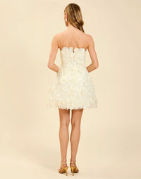 Dottie Lace Mini Dress in Ivory guipure lace with strapless neckline, structured bodice with boning, and bell-skirt mini silhouette.