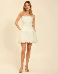 Dottie Lace Mini Dress in Ivory guipure lace with strapless neckline, structured bodice with boning, and bell-skirt mini silhouette.