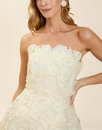 Dottie Lace Mini Dress in Ivory guipure lace with strapless neckline, structured bodice with boning, and bell-skirt mini silhouette.