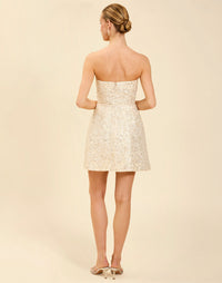 Dottie Mini Dress in Sugar Swizzle with beaded linen organza, strapless neckline, structured bodice with boning, and bell-skirt mini silhouette.