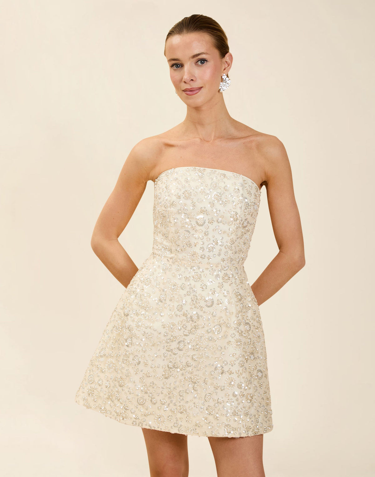 Dottie Mini Dress in Sugar Swizzle with beaded linen organza, strapless neckline, structured bodice with boning, and bell-skirt mini silhouette.