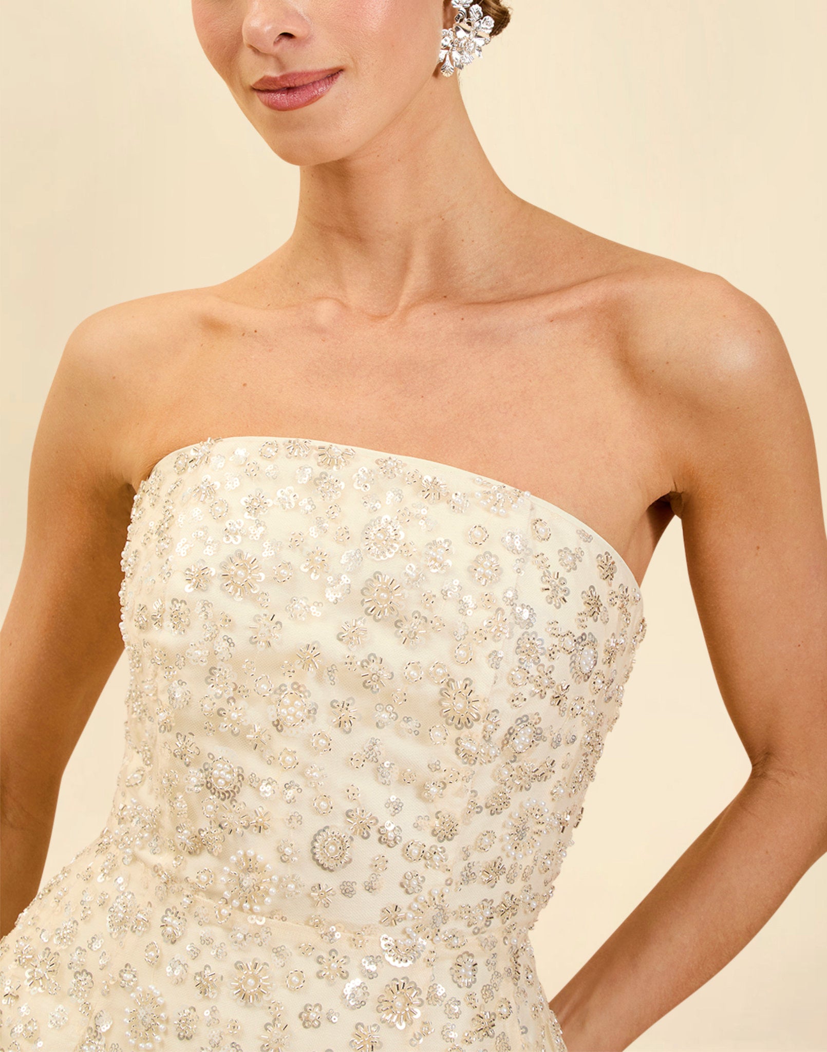 Dottie Mini Dress in Sugar Swizzle with beaded linen organza, strapless neckline, structured bodice with boning, and bell-skirt mini silhouette.