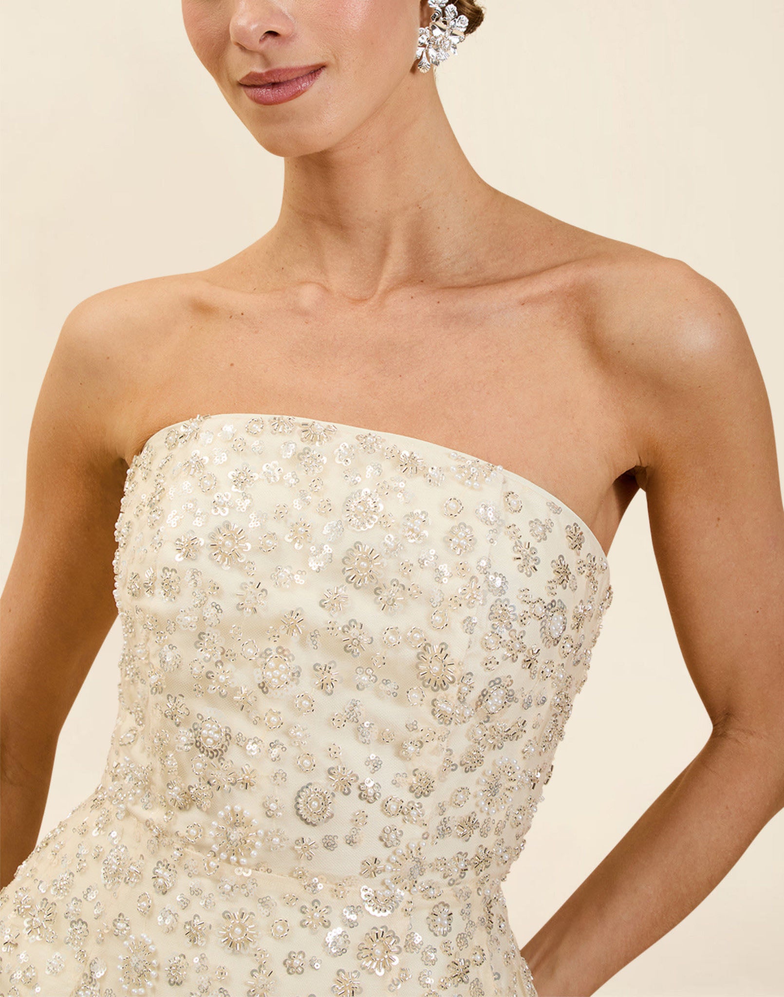 Dottie Mini Dress in Sugar Swizzle with beaded linen organza, strapless neckline, structured bodice with boning, and bell-skirt mini silhouette.