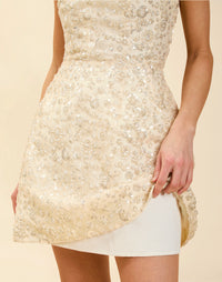 Dottie Mini Dress in Sugar Swizzle with beaded linen organza, strapless neckline, structured bodice with boning, and bell-skirt mini silhouette.