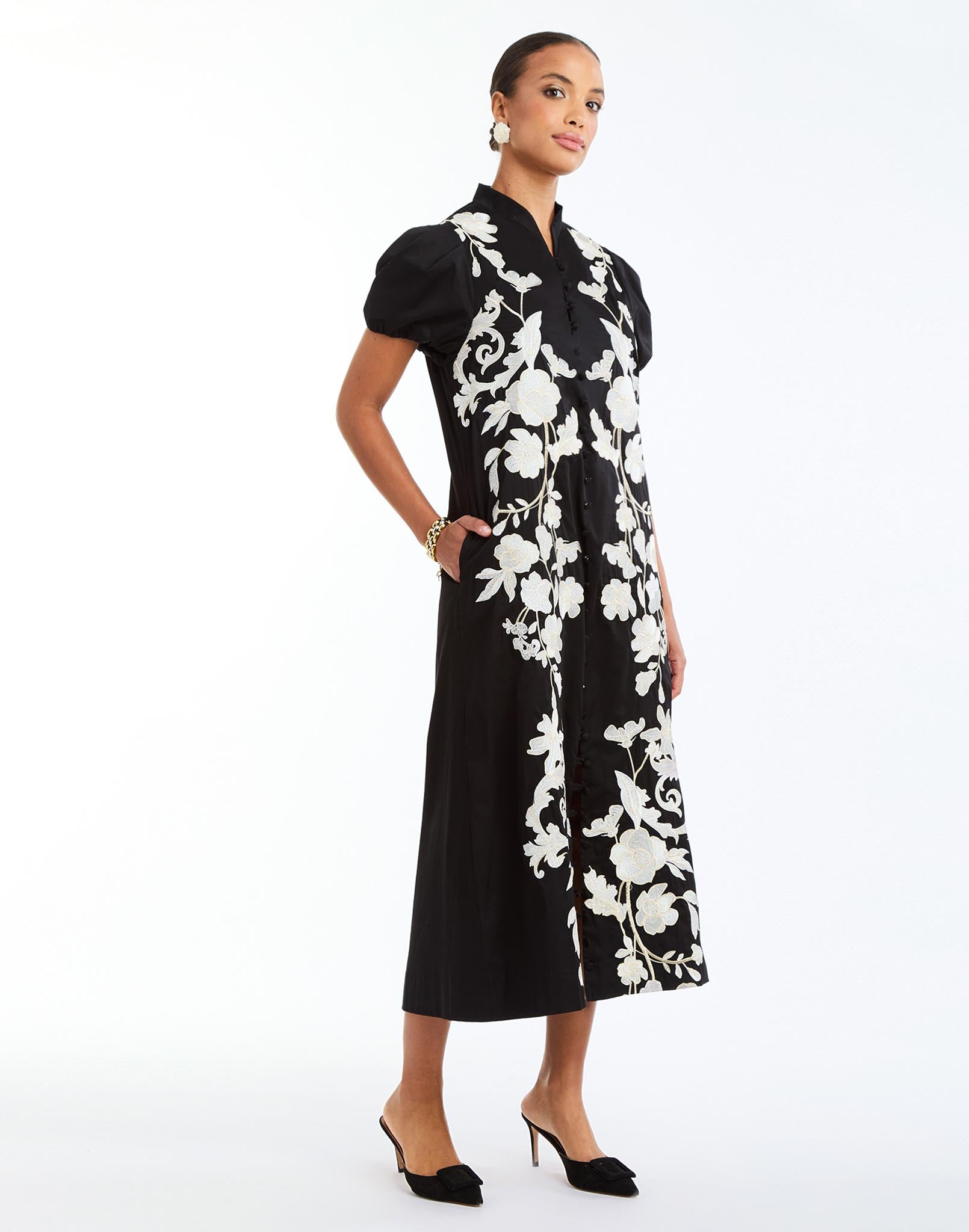 Elliana Barong Midi Dress in Black Ivory full body – embroidered A-line midi dress with puff sleeves, V-neckline, and side seam pockets by Mestiza New York.
