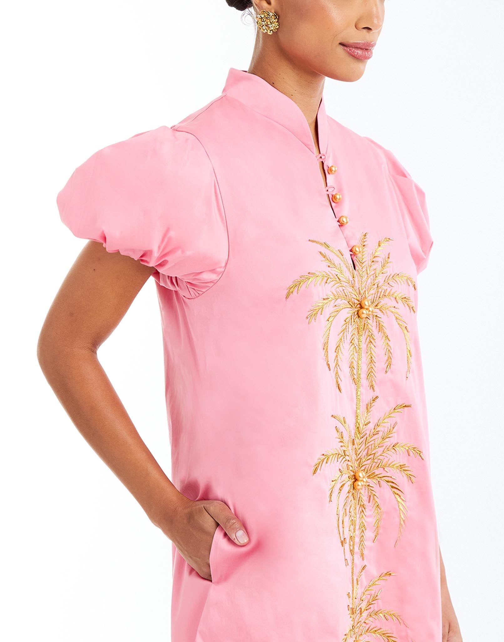 Elliana Barong Mini Dress in Aurora Pink pocket detail – shift mini dress with palm tree embroidery, puff sleeves, mandarin collar, and side pockets by Mestiza New York.