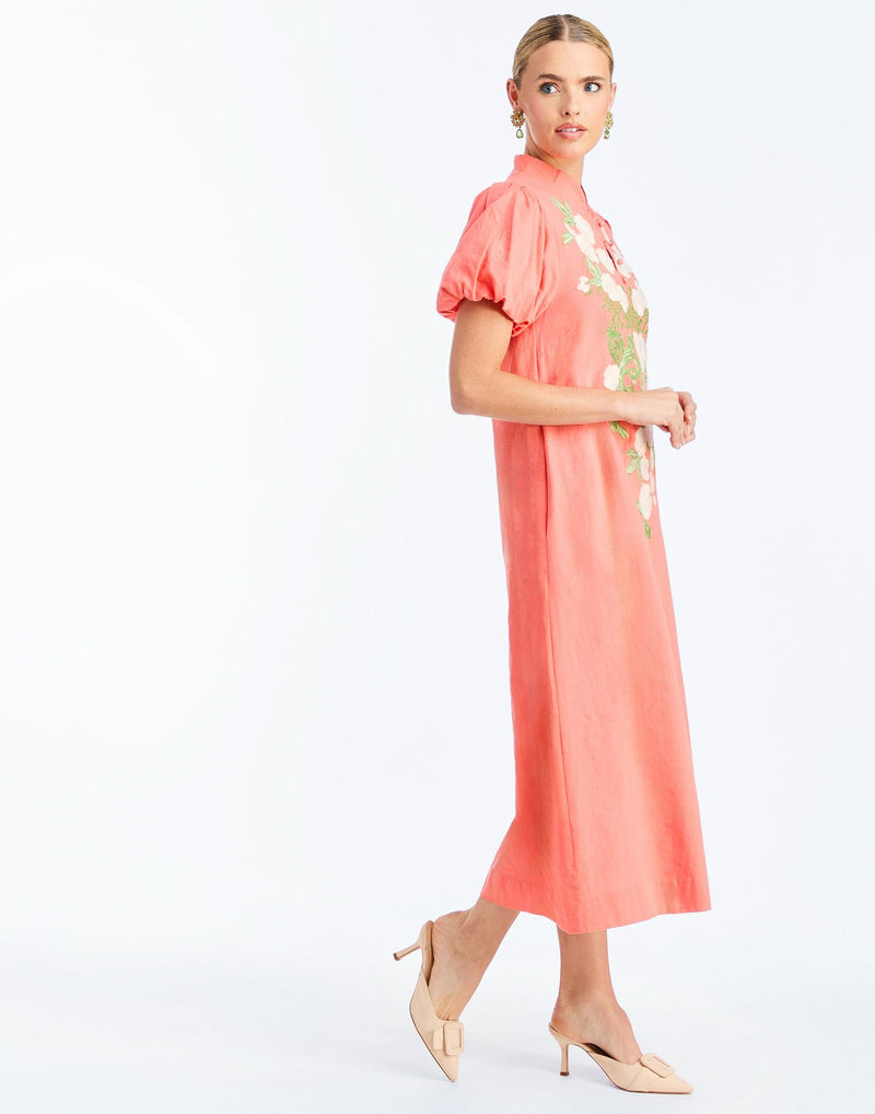 Side - Elliana Midi Dress in Fresco Sunset is an embroidered linen midi with puff sleeves, mandarin collar, and floral center-front detail.