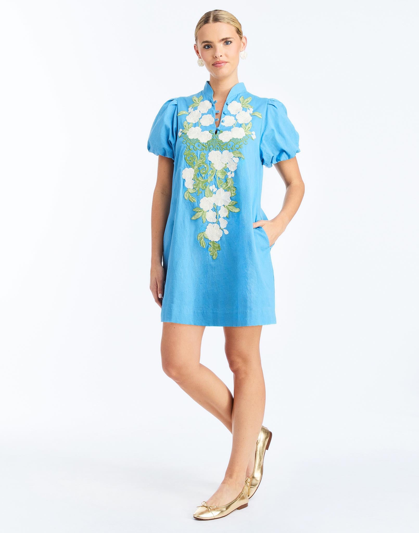 Front - Elliana Mini Dress in Cobalt Blue is an embroidered linen mini with V-neck, puff sleeves, and floral detailing.
