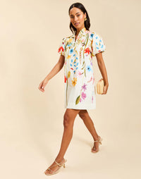 Elliana Mini Dress in Garden Muse floral cotton poplin with mandarin collar, pleated puff sleeves, shift silhouette, and side pockets.