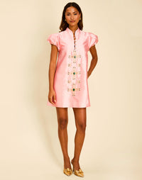 Elliana Mini Dress in Blush Tulip with a mandarin collar, pleated puff sleeves, and beading down the front.
