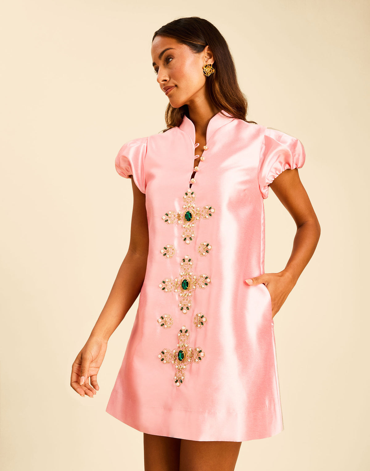 Elliana Mini Dress in Blush Tulip with a mandarin collar, pleated puff sleeves, and beading down the front.
