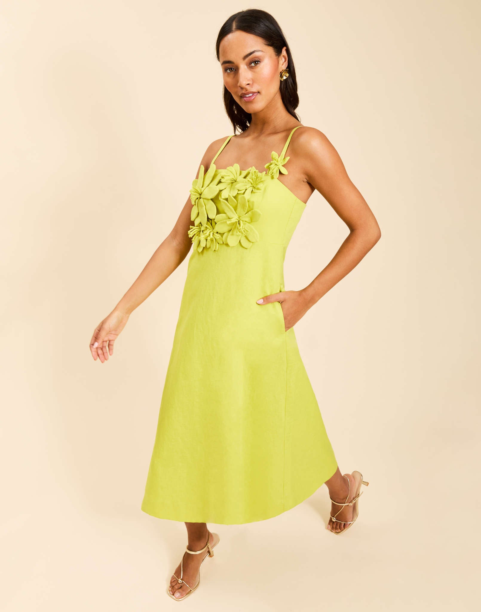 Esperanza Midi Dress in Citrus Green linen with 3D floral detailing, square neckline, adjustable straps, empire waist, and A-line midi skirt.