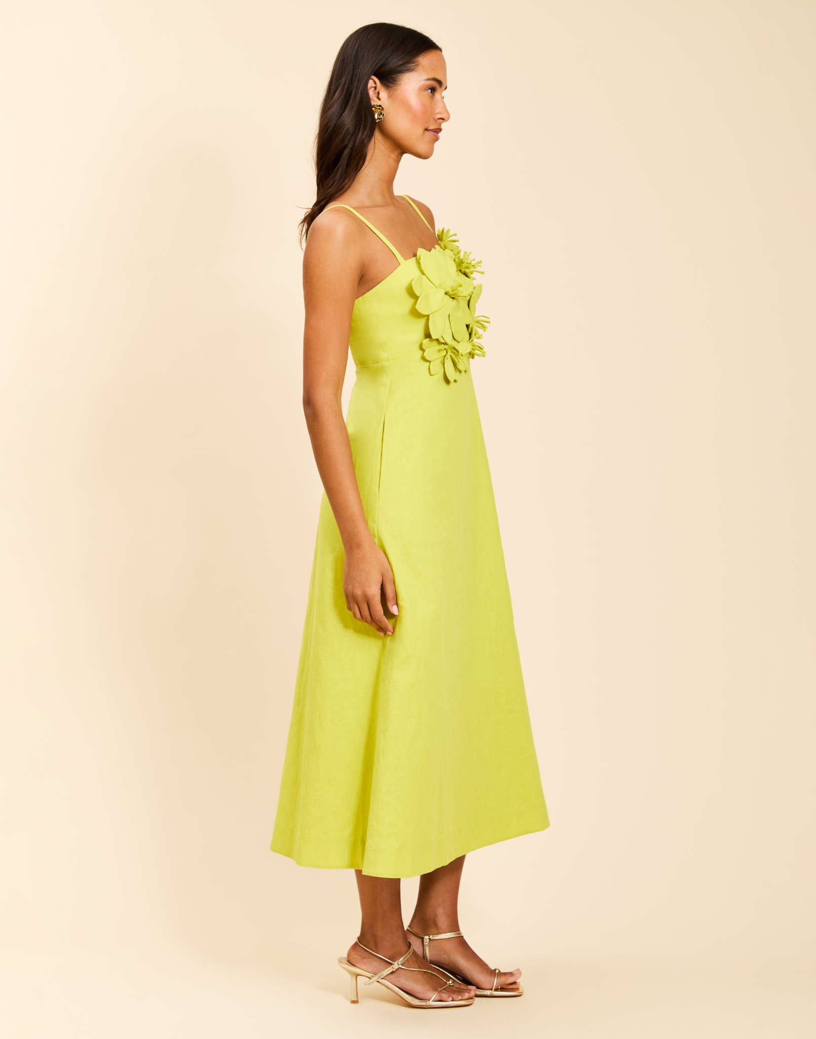 Esperanza Midi Dress in Citrus Green linen with 3D floral detailing, square neckline, adjustable straps, empire waist, and A-line midi skirt.