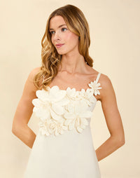 Esperanza Midi Dress in Ivory linen with 3D floral appliqué, empire bodice, adjustable straps, and elegant A-line midi skirt.
