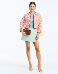 Front - Este Quilted Jacket in Calypso Waltz is a reversible quilted cotton jacket with piping and patch pockets.